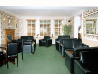 The sitting area and restaurant at The Douglas Arms Hotel