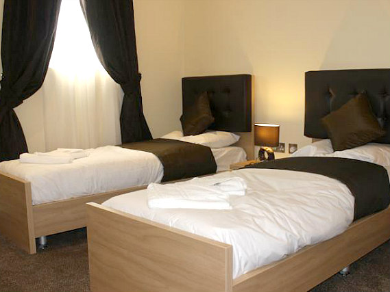 A spacious twin room at Shoreditch Inn