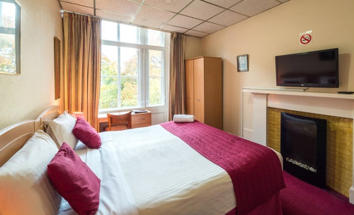 Get a good night's sleep in your comfortable room at Kelvin Hotel West End