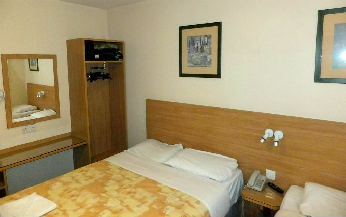 A typical triple room at Colliers Hotel