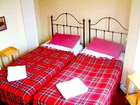 A twin room at Windsor House Hotel