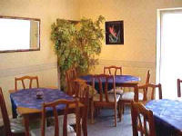 The comfortable dining room at Martel Guest House