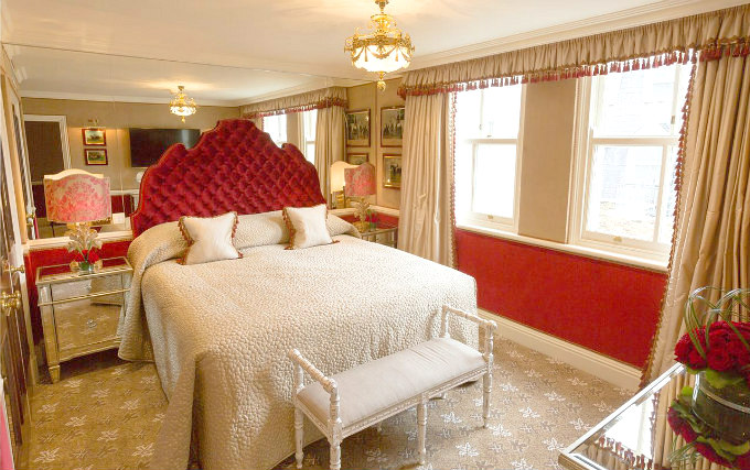 A comfortable double room at The Milestone Hotel