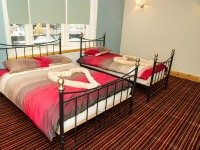 A typical triple room at Fountain Hotel London