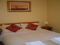 A Typical Double Bedroom at Relax Guest House