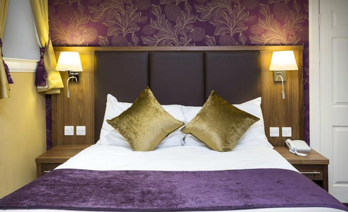 Rest easy in a comfortable bed in your room