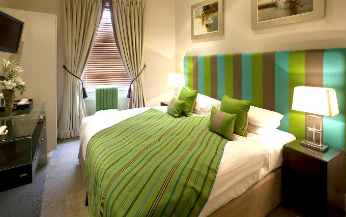 A comfortable double room at New Linden Hotel