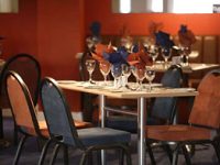 Enjoy a meal in the evening at Palms Hotel London