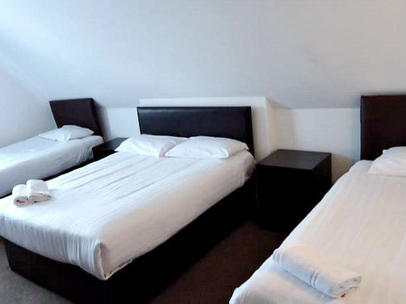 A typical quad room at Rotana Hotel