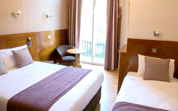 A typical triple room at The Garden View Hotel