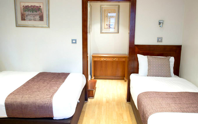 A triple room at The Garden View Hotel