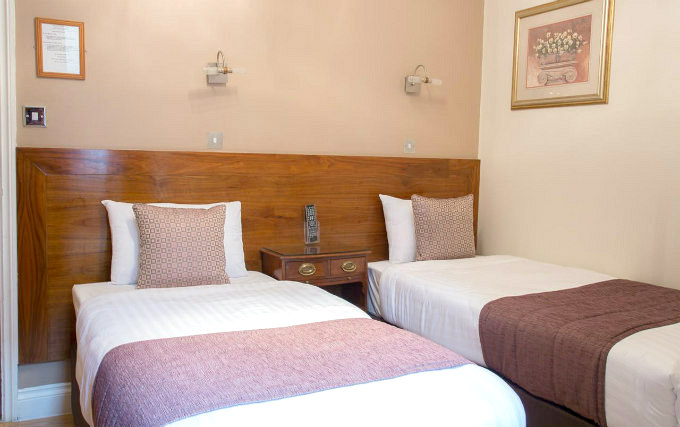 A twin room at The Garden View Hotel