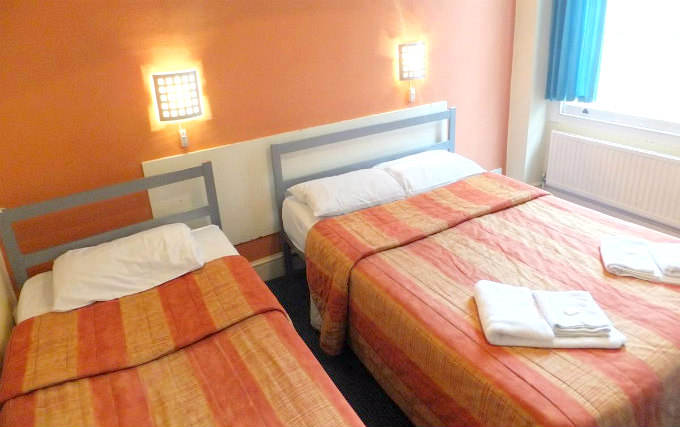 A comfortable triple room at The Gresham Hotel