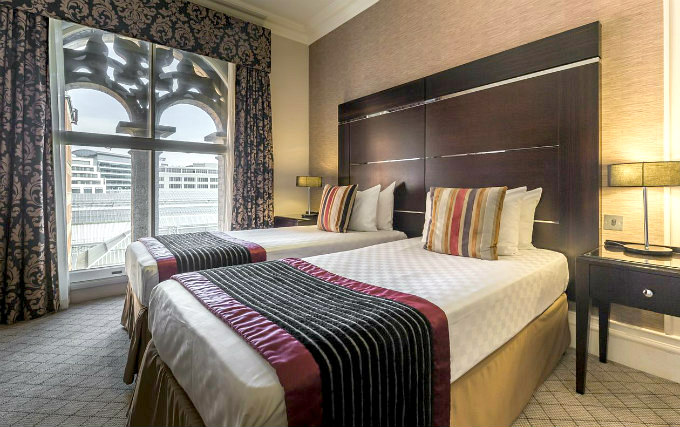 A twin room at Amba Grosvenor Hotel