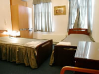 A twin room at Exhibition Court Hotel 1