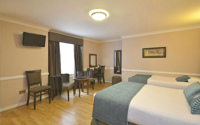 A twin room at Kyriad Hotel London