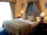 A bedroom at Gallery Hotel