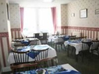 Breakfast is served in the cosy reception room