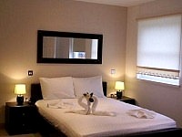 A typical double bedroom at 39 Suites