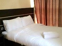 A typical double room at New Globe Hotel