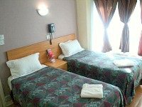 All rooms are comfortable and clean making Jims Guest House great value for money Typical twin room at Jims Guest House