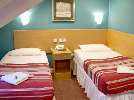 Get a good night's sleep in your comfortable room at London Guest House Acton