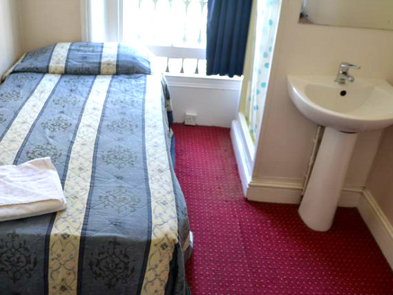 A typical single room at Blair Victoria Hotel