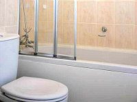 An ensuite bedroom at Home Away From Home