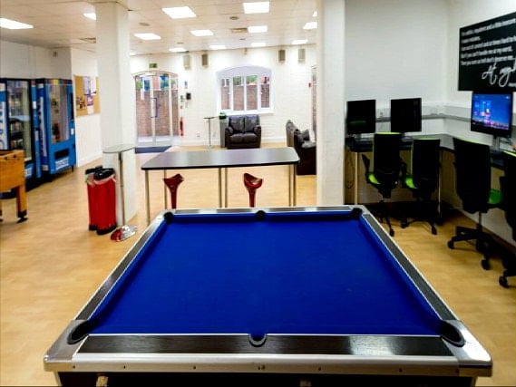 Common room with pool table and lounge