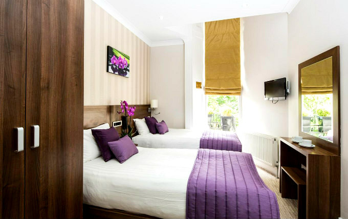 A twin room at London House Hotel