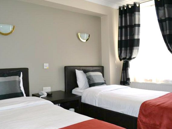 A twin room at Hyde Park View Hostel is perfect for two guests
