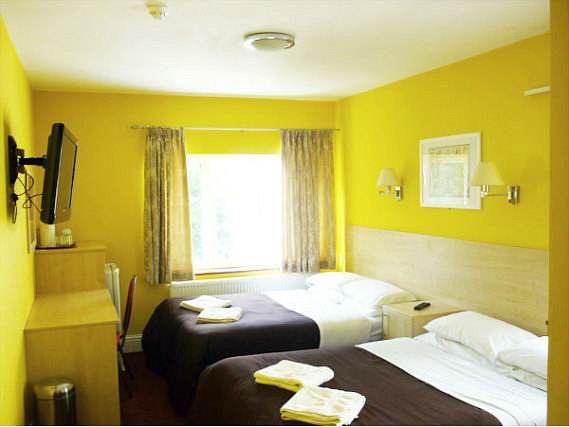 Get a good night's sleep in your comfortable room at The Acton Town Hotel