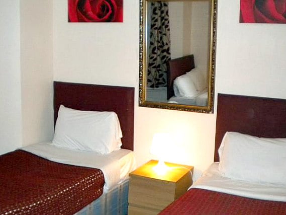 A twin room at Royal London Hotel is perfect for two guests