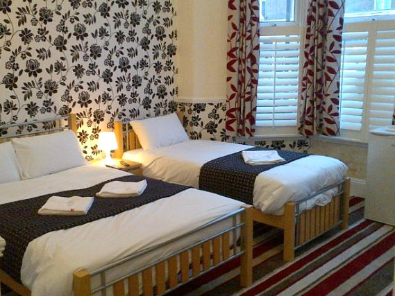 A typical triple room at Royal London Hotel