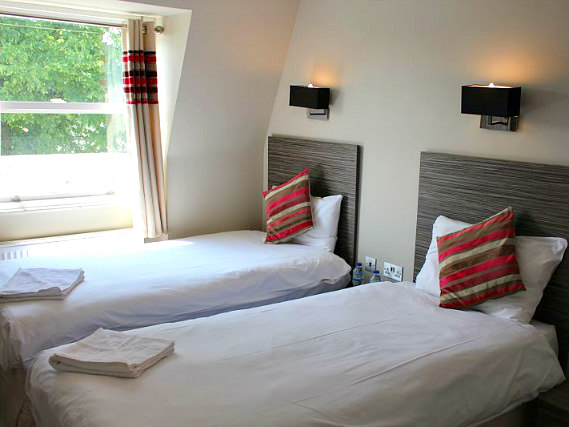 A twin room at Sara Hotel London is perfect for two guests
