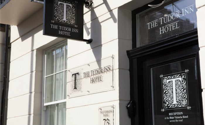 An exterior view of Tudor Inn Hotel