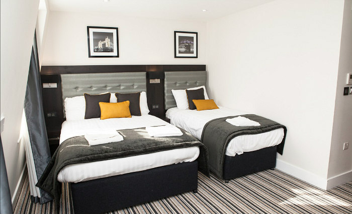 A typical triple room at Tudor Inn Hotel