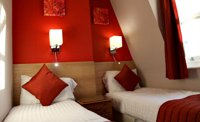 A twin room at Sheriff Inn London is perfect for two guests
