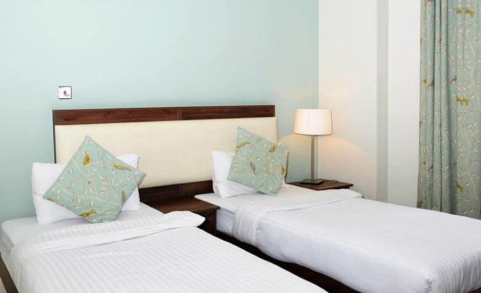 A comfortable twin room at Hyde Park Boutique Hotel