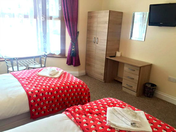 A twin room at Hub House London is perfect for two guests