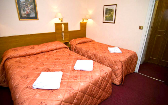 A typical triple room at Alexandra Hotel