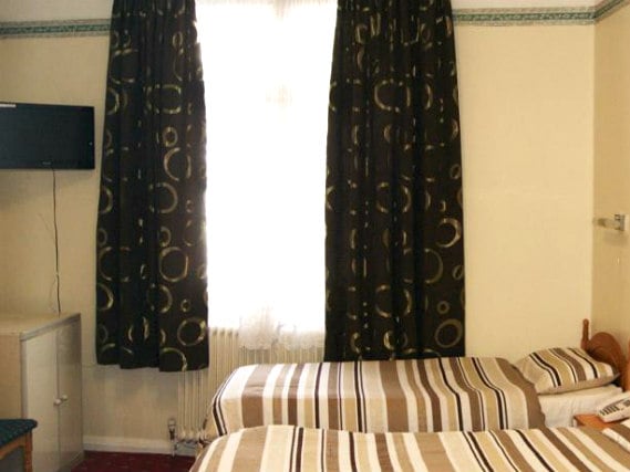A twin room at Stanley House Hotel is perfect for two guests