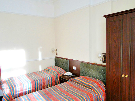 A twin room at Hallam Hotel London is perfect for two guests