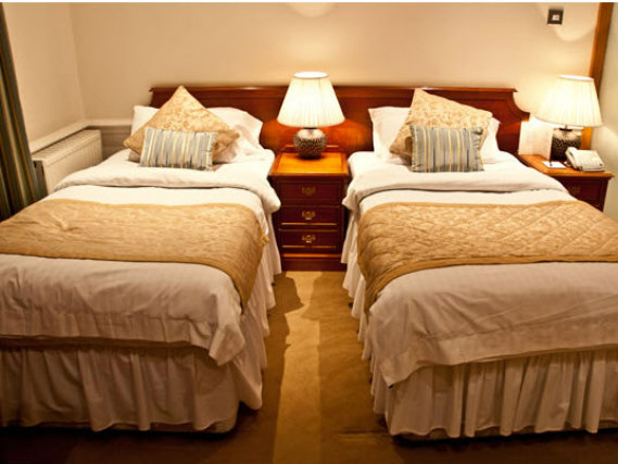 A twin room at Staunton Hotel London is perfect for two guests