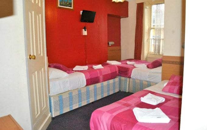 A typical quad room at Guilford Hotel