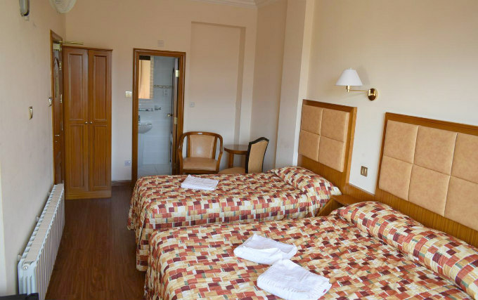 A comfortable triple room at Leigham Court Hotel