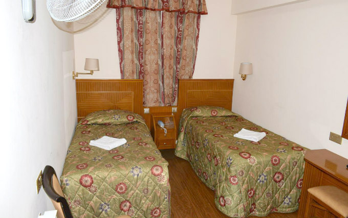 A comfortable twin room at Leigham Court Hotel