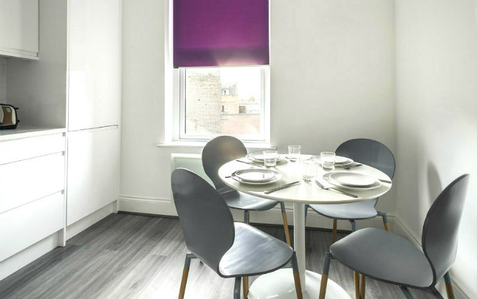 A typical dining room at Smart Stay Swiss Cottage