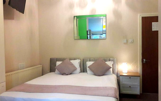A typical double room at United Lodge Hotel and Apartments