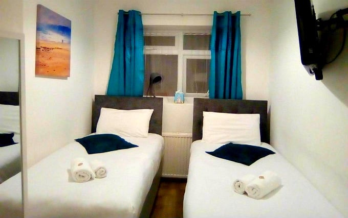 A twin room at United Lodge Hotel and Apartments
